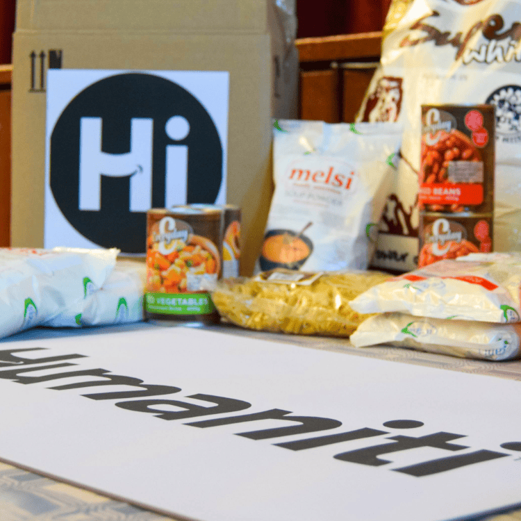 A table full of food packages from Humaniti